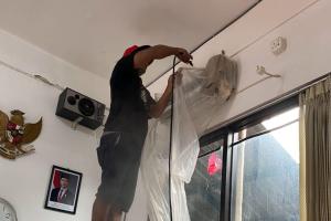 Cuci AC di SMK Telkom Malang